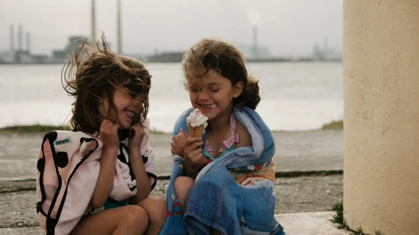 Two Girls eating Ice Cream Cone_master